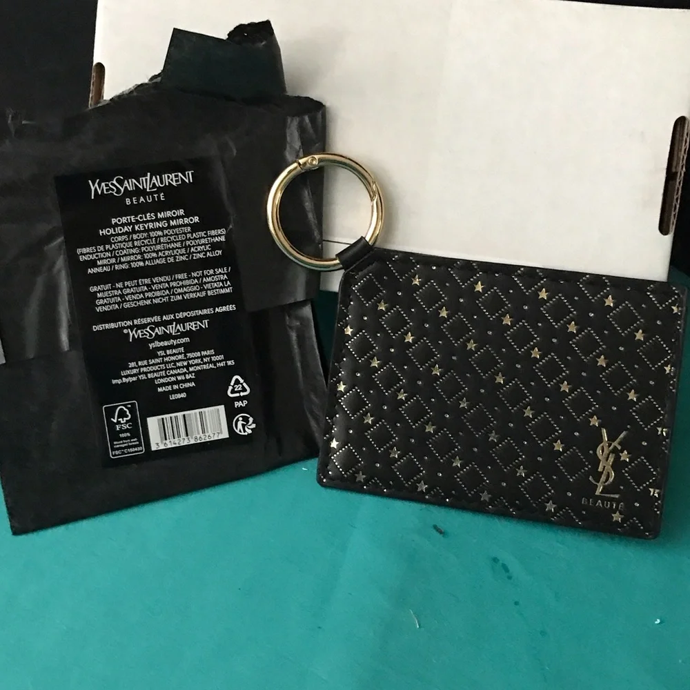 Yves Saint Laurent Quilted Black and Gold Key Holder